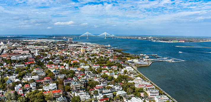 Aerial view of the city of Charleston peninsula including the Cooper River and the Ravenel Bridge. 