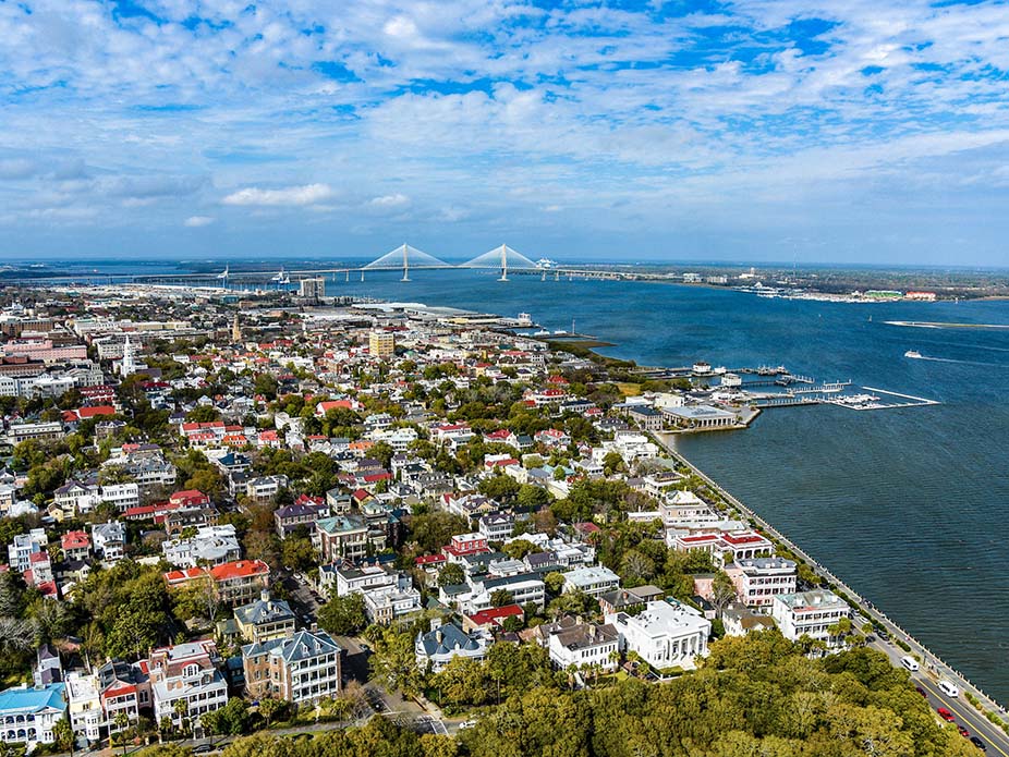 An aerial view of Charleston peninsula including the Cooper River and the Ravenel Bridge. 