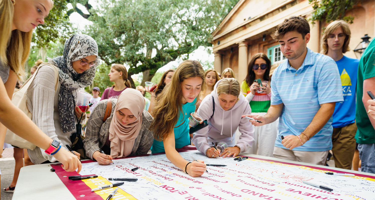 A College of Charleston tradition, students sign "the book" on their first day