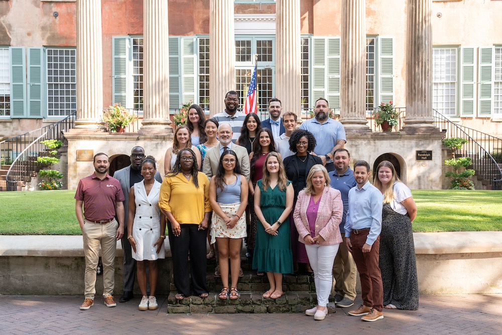 Members of the College of Charleston Admissions Staff standing outside Randolph Hall.