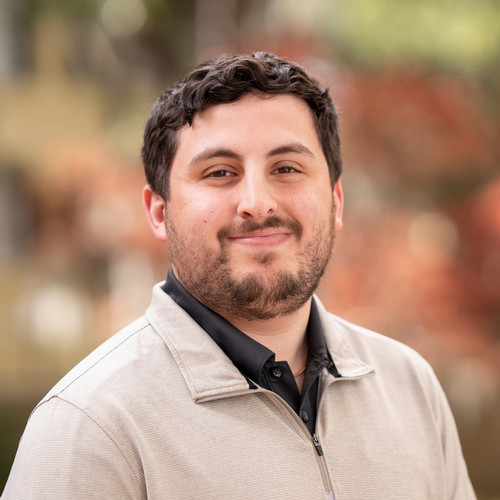 Headshot/photo of Sam Floyd. He is College of Charleston Campus Recreation Services Coordinator