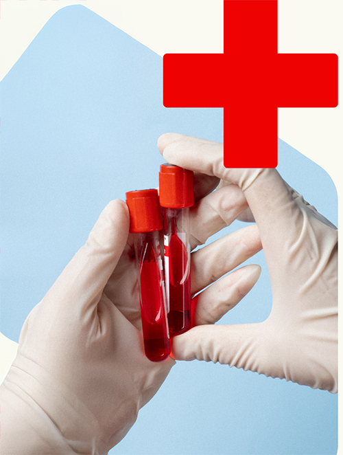Gloved hands holding two test tubes filled with blood, with a red medical cross above.