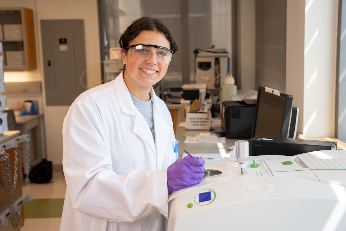 Research student Julianna DeMauro uses the FT-IR while doing research with Dr. Forsythe (summer 2024)