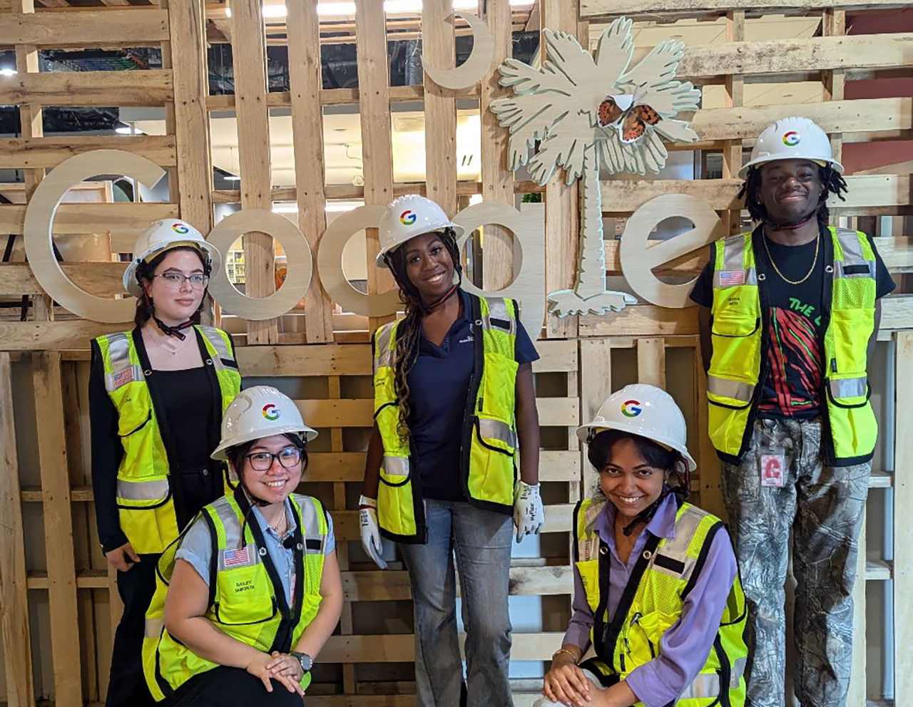 students in safety gear pose at Google Data Center