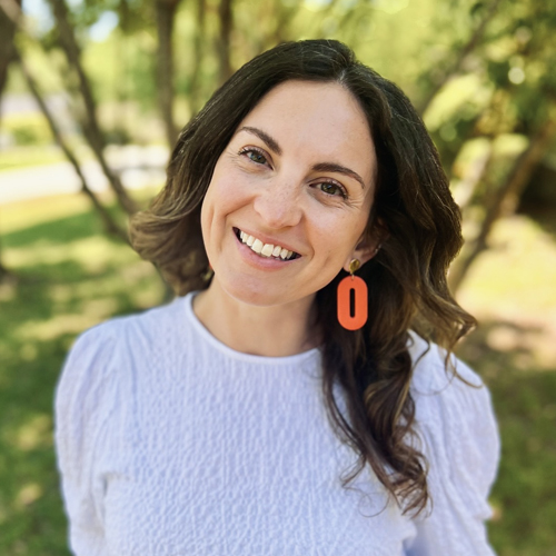 Headshot of Emily Lee, a smiling woman with long brown hair