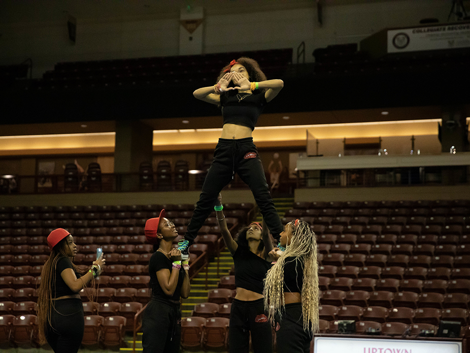 NPHC members doing a pep supper dance performance.