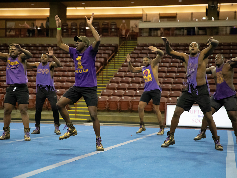 NPHC male members doing a pep supper dance performance.