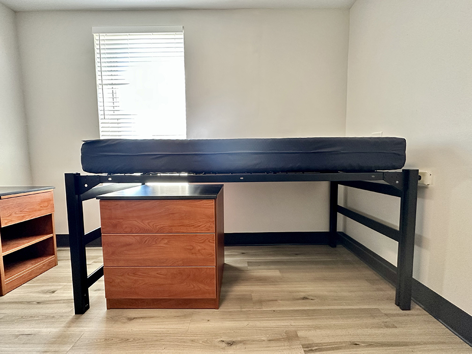 semi-lofted bed with a 3-drawer chest of drawers under it