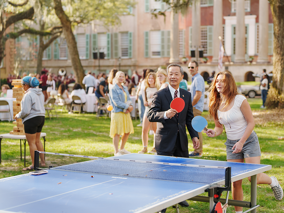 President Hsu plays table tennis with College of Charleston students.