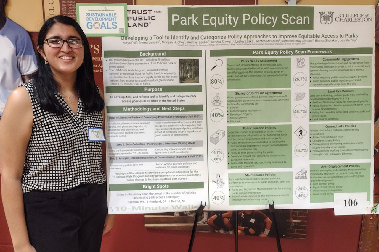 Maya Pai with her Park Equity Policy Scan research poster.