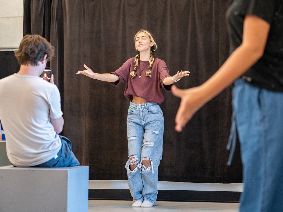 Group of College of Charleston students at Machu Picchu with scenic mountains in the background.