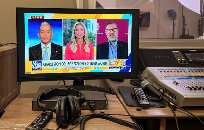 3 people in conversation on a national TV show