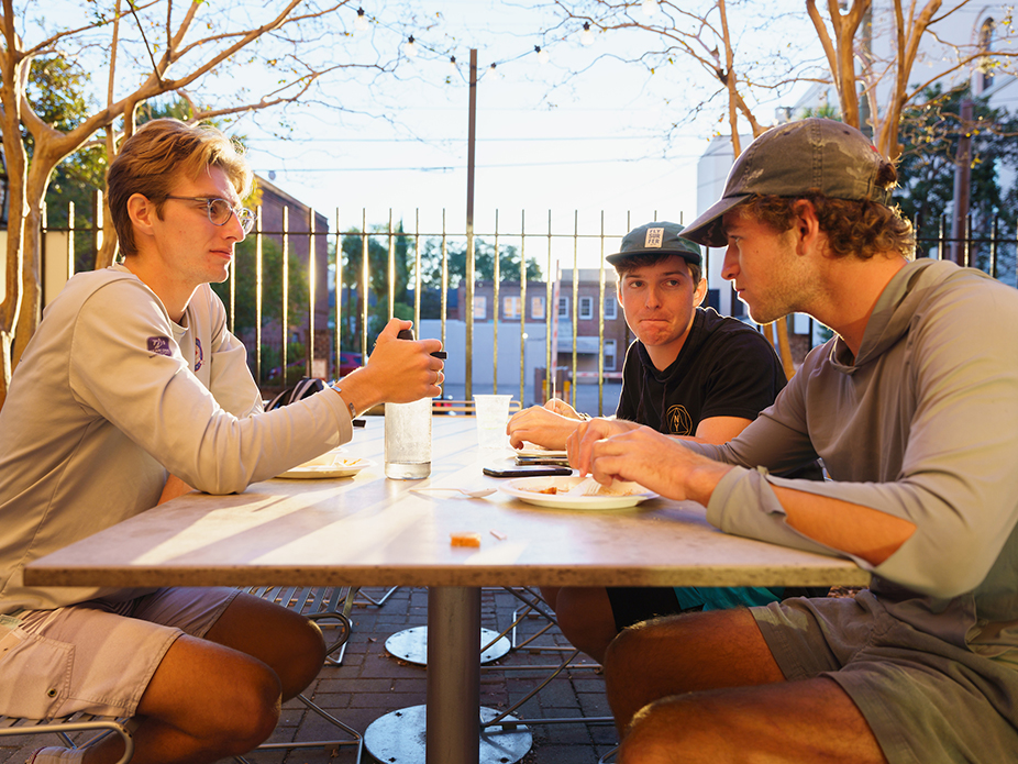College of Charleston students enjoying a lunch break outdoors.