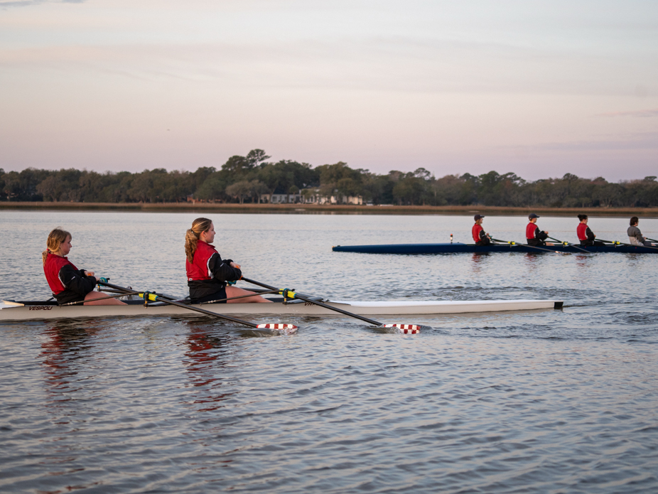 Members of the College of Charleston crew club team row in the early morning hours.