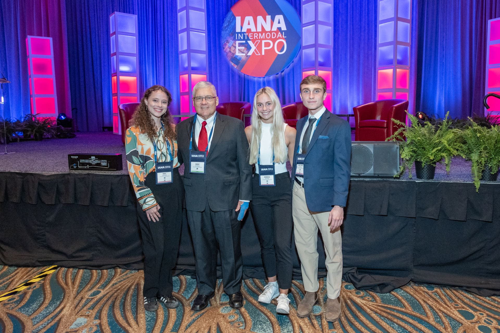 Students pose with professor Kent Gourdin at IANA case competition