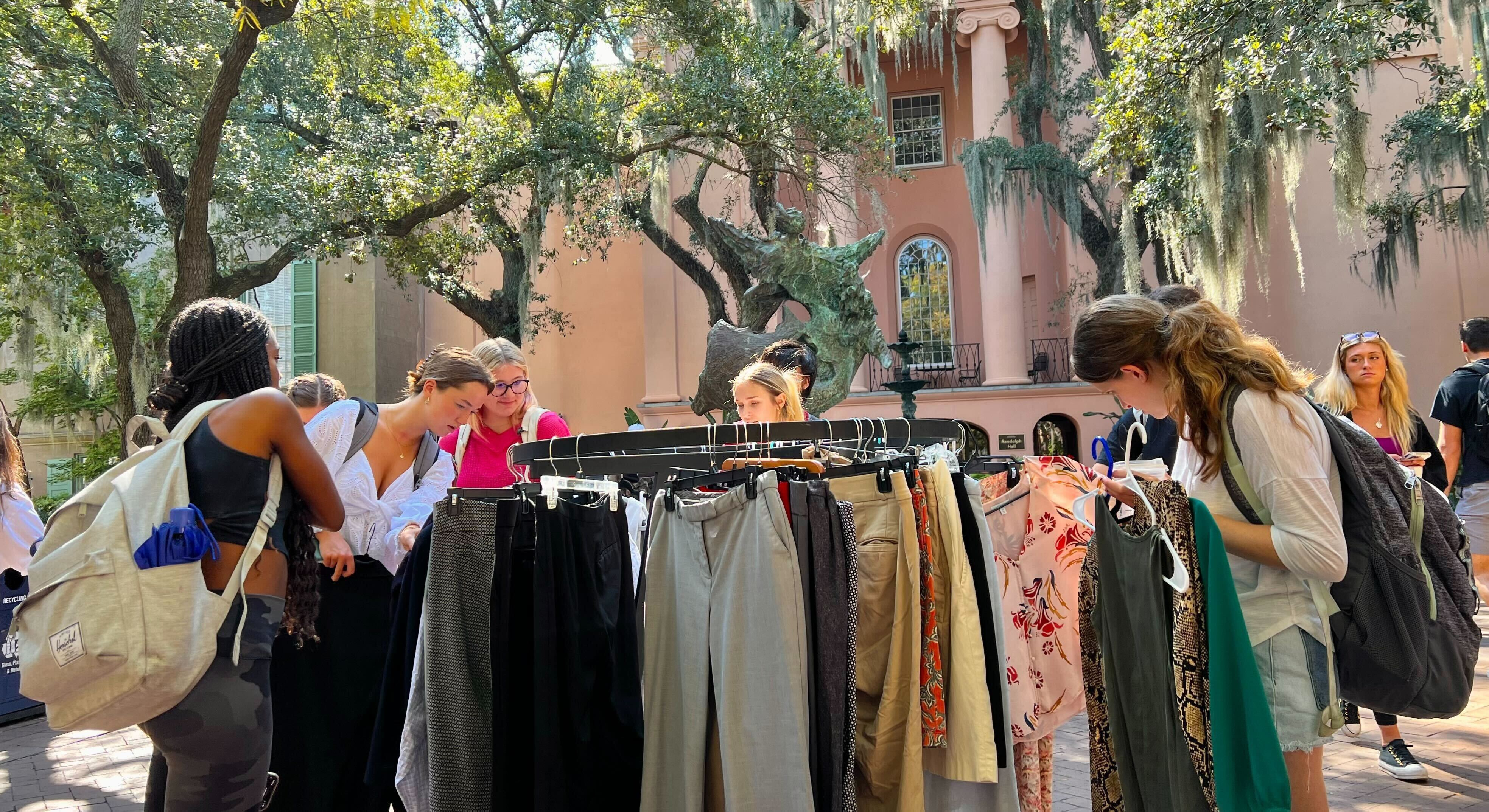 a group of students attending a Free Store popup event in the Cistern Yard
