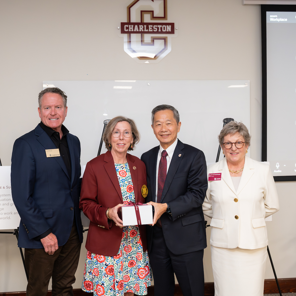 President Hsu present and BOT president honor an outgoing trustee for their service to the College. 
