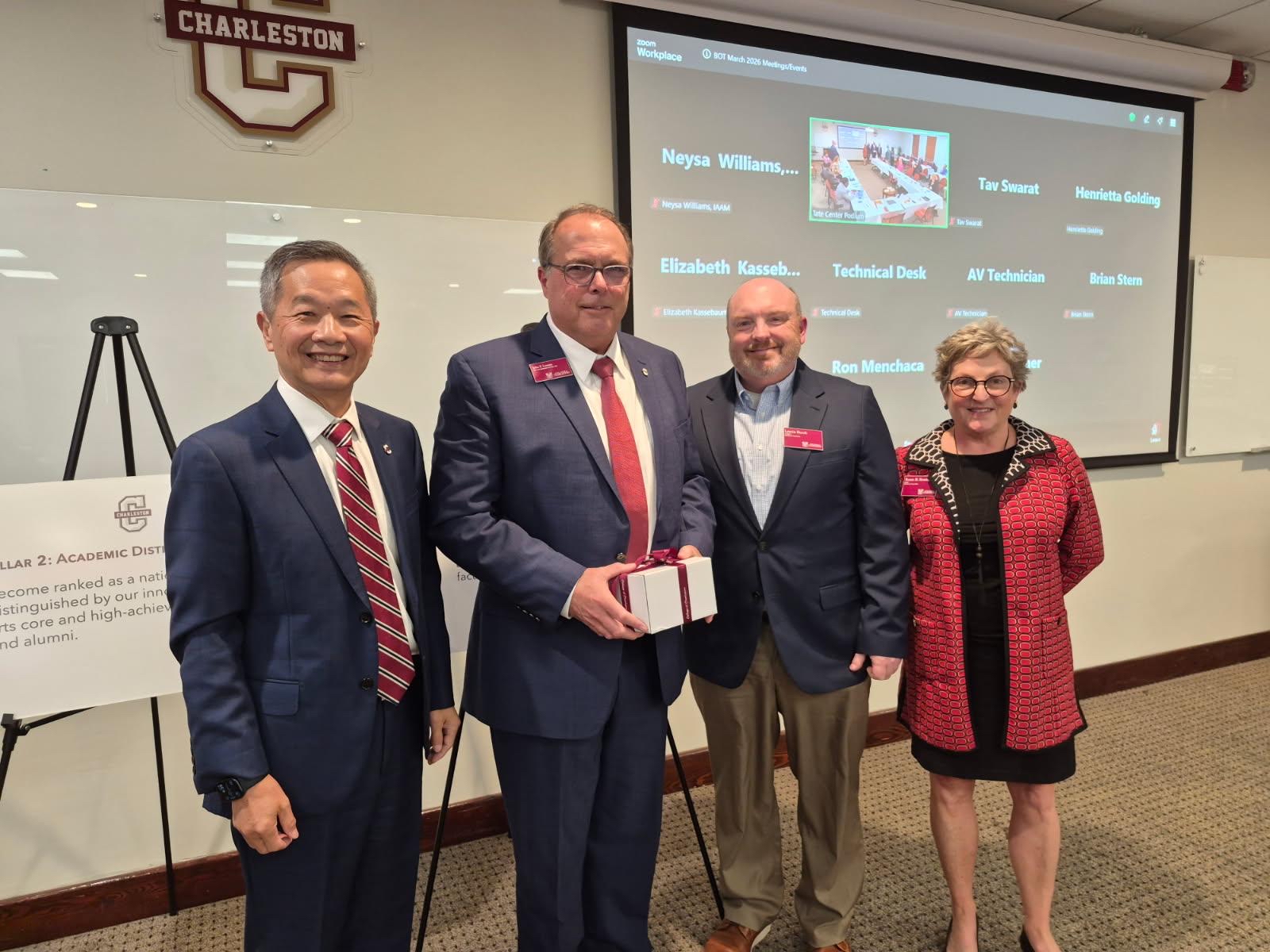 Board of Trustee Members and President Hsu present a gift to John Loonan for his six year of service at the College